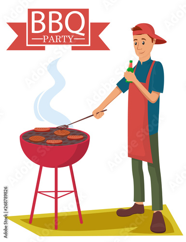 Man cooking bbq and drinking a beer