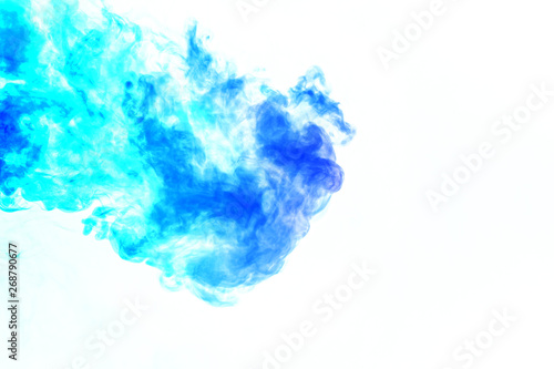Colorful steam exhaled from the vape with a smooth transition of color molecules from turquoise to blue on a white background like a collision of two jets of smoke. Malicious virus and drug injection.