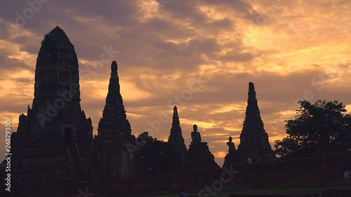 wide shot panned left of Sunset Wat Chaiwatthanaram Ayutthaya Thailand , Panning Left, Panning.