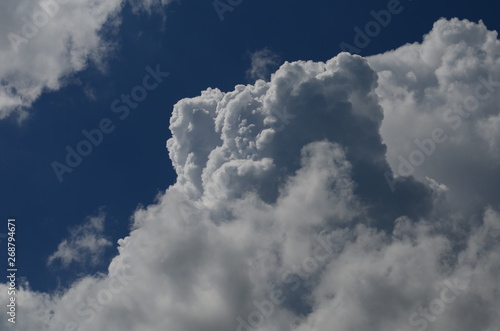 blue sky with beautiful white fluffy clouds