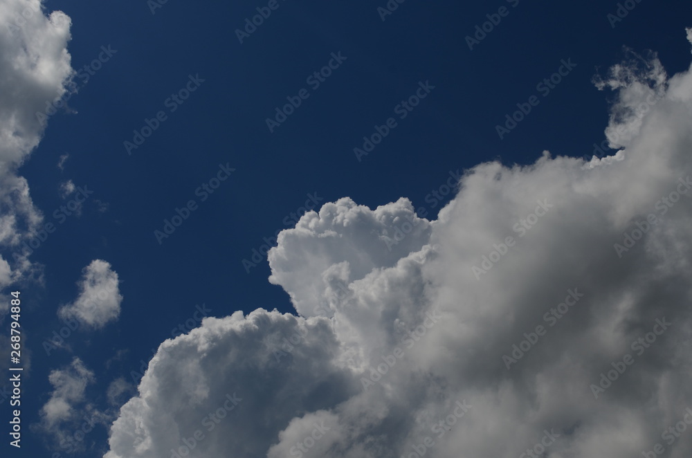 blue sky with beautiful white fluffy clouds blue sky with beautiful white fluffy clouds