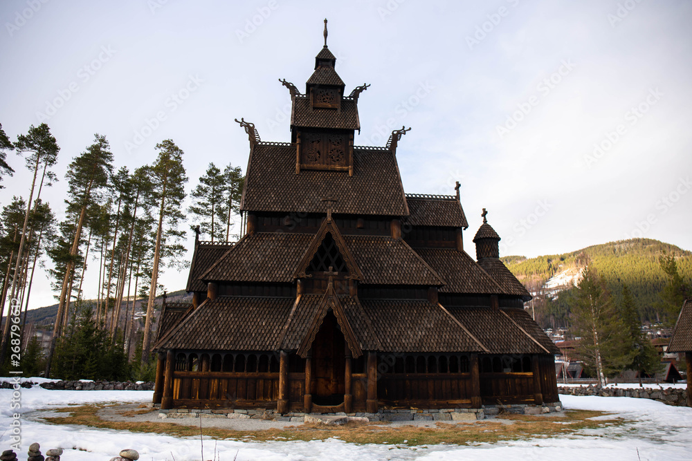 old wooden church in winter