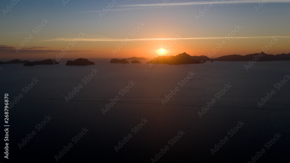 sunset over the sea.Sunset over the sea. Sea pyezhzh with islands during sunset.