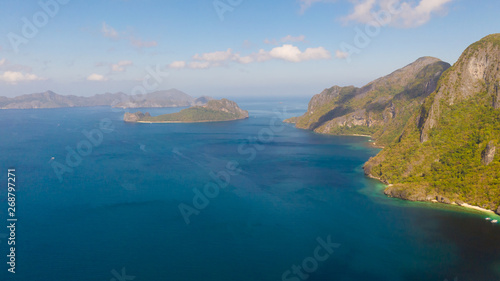 Seascape, view from above. Rocky islands covered with rainforest. El nido, Philippines, Palawan. Blue sea and the archipelago with tropical islands.