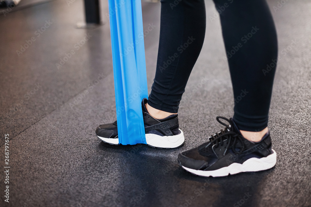 Fitness Exercise. Sports Woman Exercising With Resistance Band Fitness Exercise. Sports Woman Exercising With Resistance Band