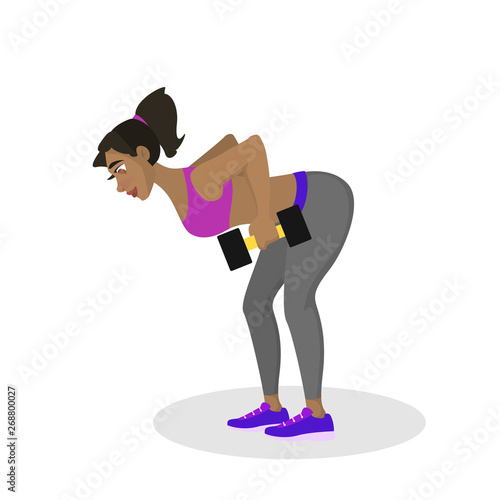 Woman with dumbbell. Doing sport exercises in gym