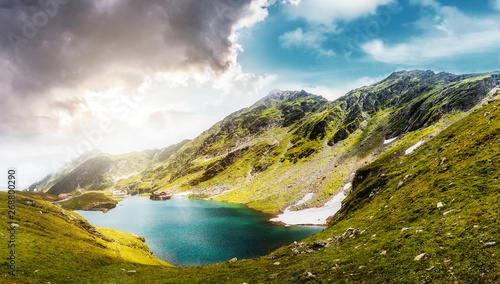 Fototapeta Naklejka Na Ścianę i Meble -  wonderful sunny landscape. mountain lake with perfect sky.