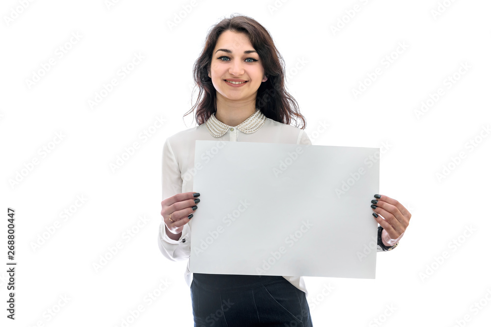 Young woman holding empty sheet of paper isolated Young woman holding empty sheet of paper isolated