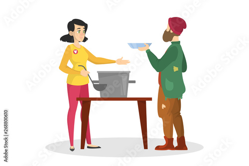 Volunteer feed homeless man. Help and support