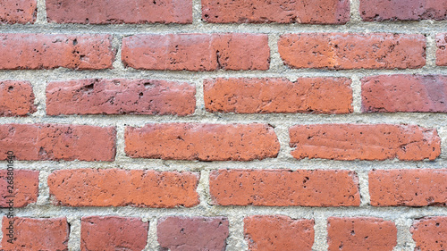 Bricks texture. Dark red brick wall. Colorful red and brown brick wall background.
