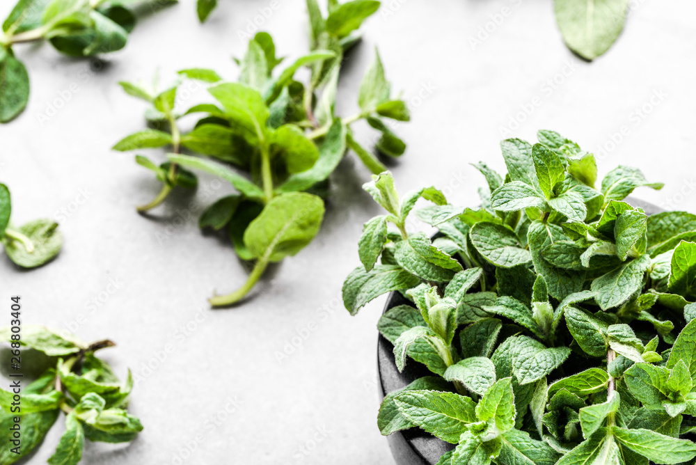 Green organic mint leaves or peppermint, fresh mint on white background Green organic mint leaves or peppermint, fresh mint on white background