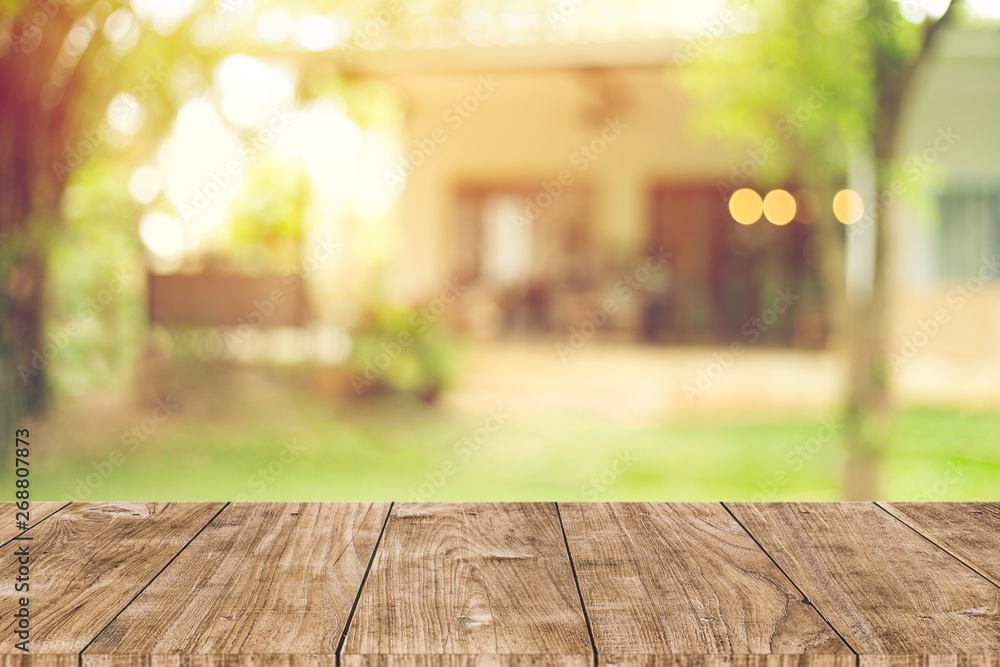 wooden table space with green home backyard view blur background for  advertising template Stock Photo | Adobe Stock
