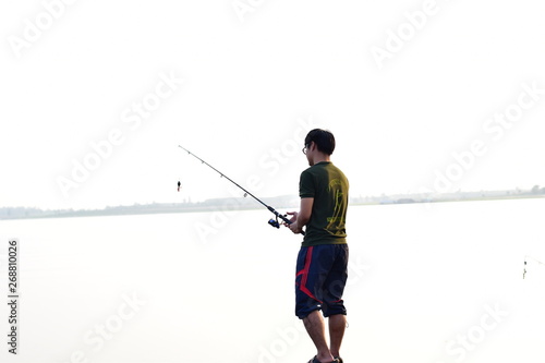silhouette of fisherman