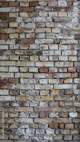 old weathered flaky brick wall
