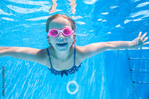 Children swim in pool