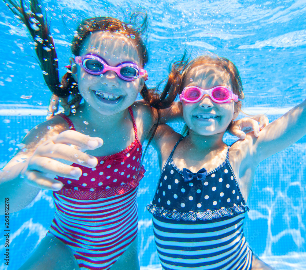Children swim in pool