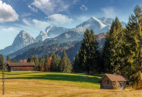 Wonderful Summer Landscape in Bavarian Alps with perfect sky. Awesome Alpine Highlands in Autumn in Sunny day . Amazing Nature Scene With Alpine valley and Zugspitze mountain on Background