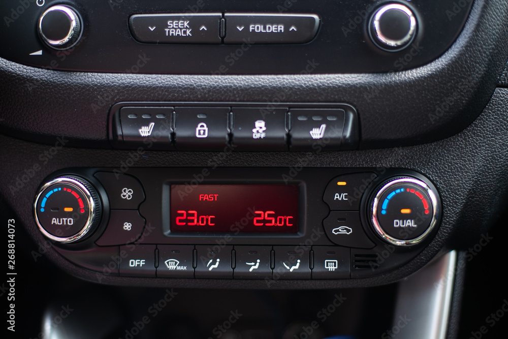 Modern car dashboard. Screen multimedia system. Climate control.