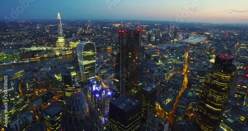 Wallpaper Mural London, England; Skyline aerial drone footage with views of the Gherkin and the city of London at sunset.  Torontodigital.ca