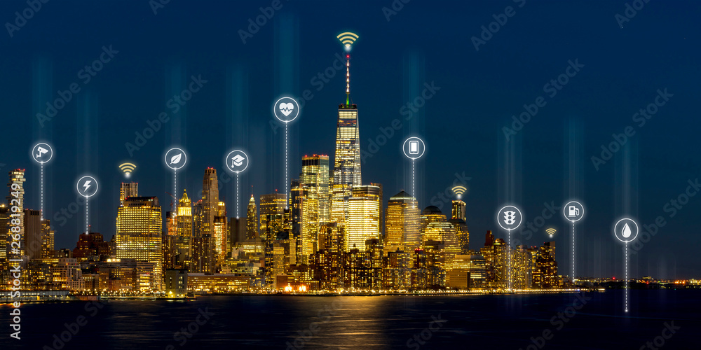 Beautiful scenic night view of new york, manhattan, usa in smart city service icon, internet of things, network technology concept. Smart city in urban downtown connected realtime sensor with people.