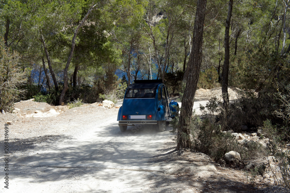 Ibiza Island.Traffic on the forest road.