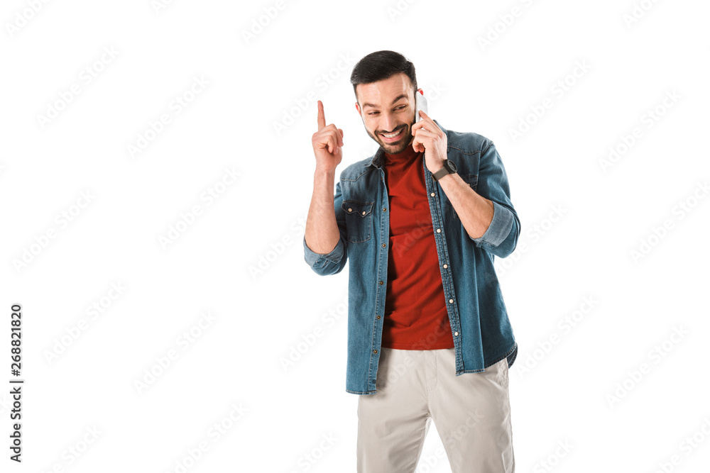 cheerful man showing idea sign while talking on smartphone isolated on white cheerful man showing idea sign while talking on smartphone isolated on white