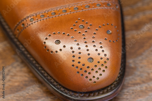 Obraz na plátně brown brogue toe of men full grain leather shoe, close up