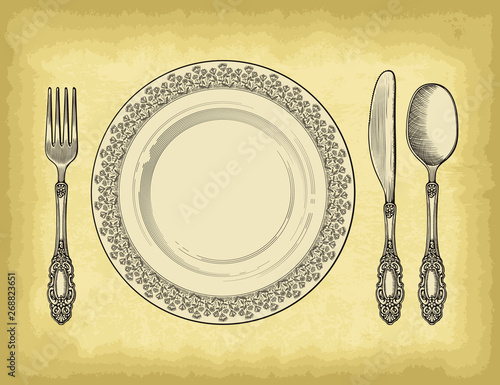 Hand drawn plate spoons, forks and knifes on old craft paper texture background. Engraved style vector illustration. Elements for your design works.