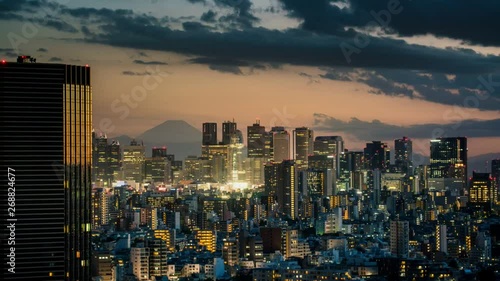 TL D2N day to night Tokyo skyline , Shinjuku view and Mountain fuji in Japan, Zoom out, Time-Lapse, day to night. photo