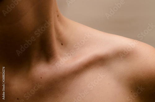 Clavicle Women with moles on the skin photo