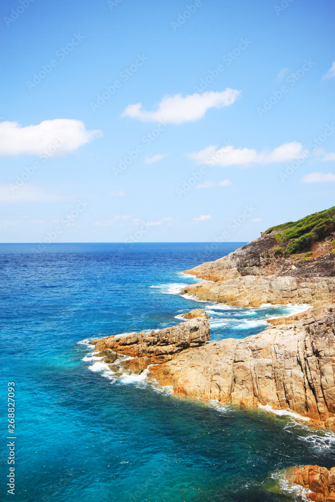 Beautiful paradise in summer of seascape and sea horizon with Calm ocean and blue sky on rock mountain Cape.Tropical Beach plants and jungle island Beautiful paradise in summer of seascape and sea horizon with Calm ocean and blue sky on rock mountain Cape.Tropical Beach plants and jungle island