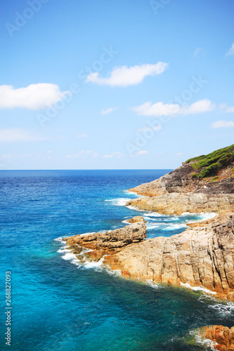 Beautiful paradise in summer of seascape and sea horizon with Calm ocean and blue sky on rock mountain Cape.Tropical Beach plants and jungle island