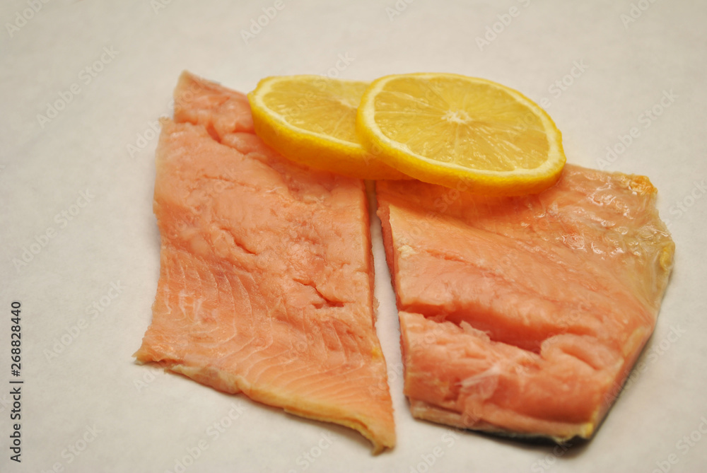 Salmon Steaks with Lemon Slices on Top