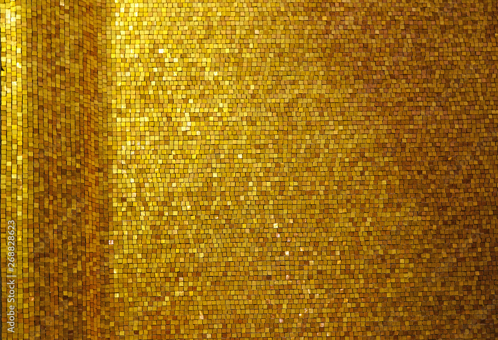 Gold colored square tile mosaic background