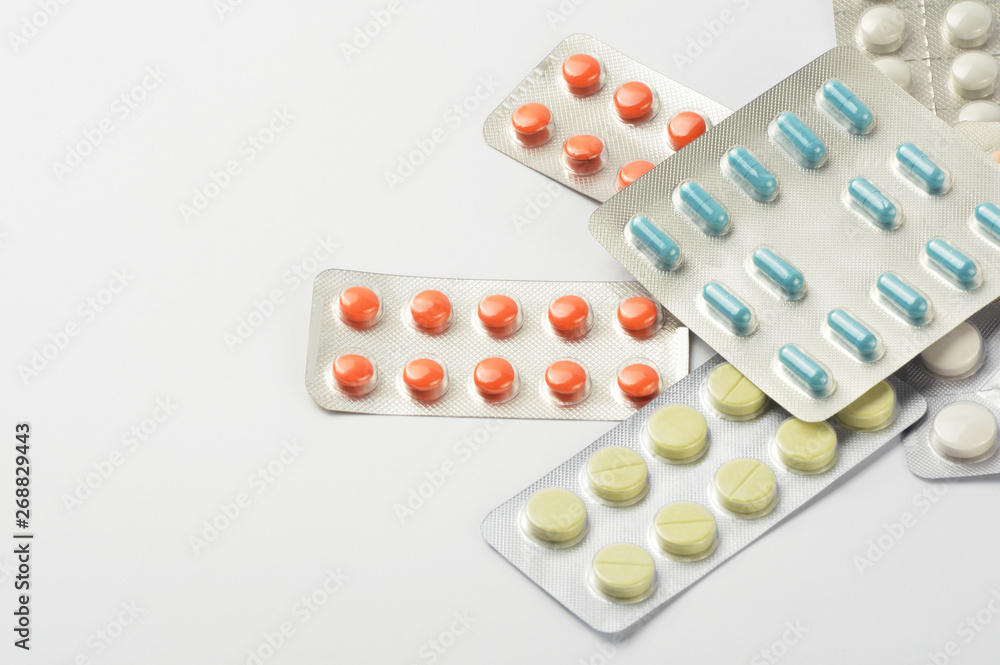 Group of multi colored pills, capsule with copy space on white background Group of multi colored pills, capsule with copy space on white background