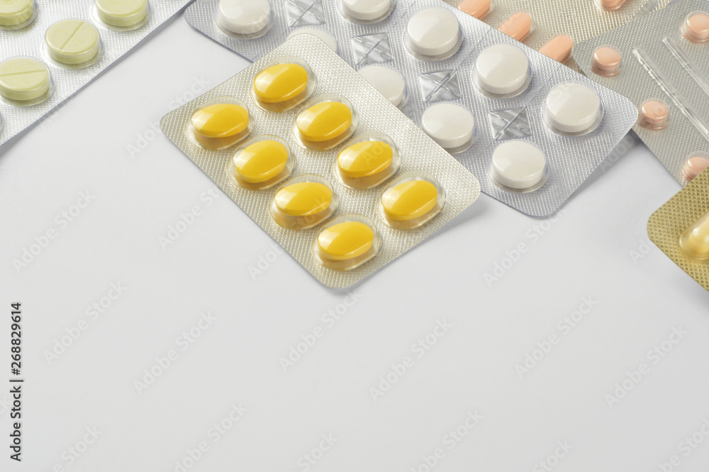 Group of multi colored pills, capsule with copy space on white background Group of multi colored pills, capsule with copy space on white background