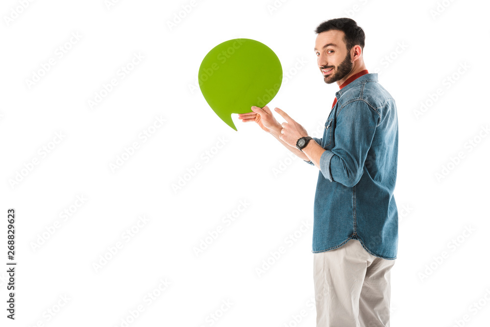 smiling handsome man in denim shirt holding thought bubble isolated on white