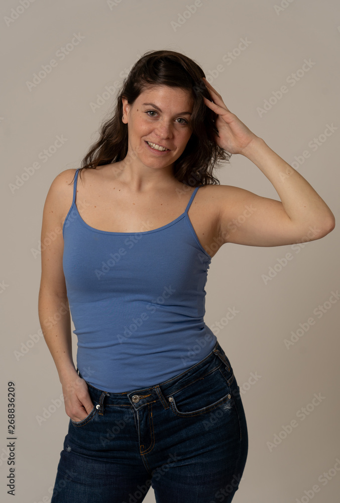 Beauty portrait of young attractive woman with curly hair and sensual young natural look Beauty portrait of young attractive woman with curly hair and sensual young natural look