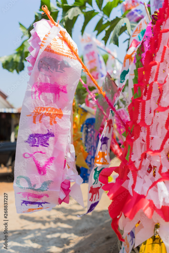 Colorful paper flags or tung for songkran festival at the temple in chiang mai   