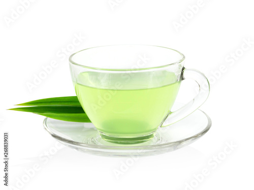 Glass of pandan juice with green leaves isolated on white background