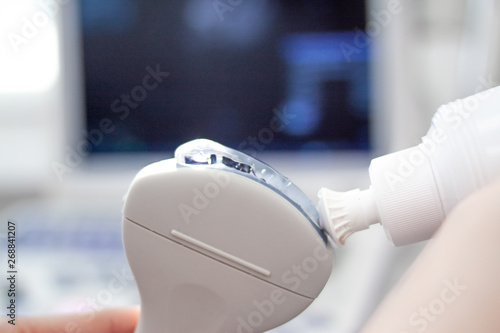 Closeup Ultrasound scanner equipmentin in clinic hospital. Diagnostics, sonography and health concept. Copyspace photo
