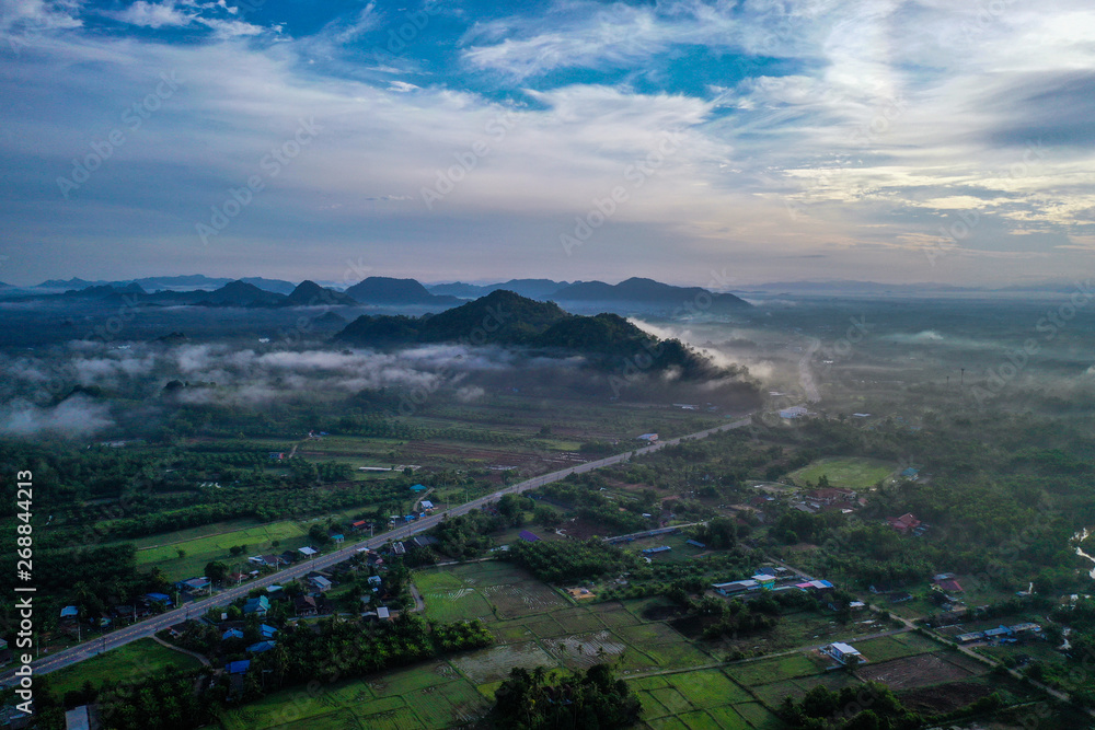 Aerial drone view of Pakbara small village during cloudy morning, Thailand