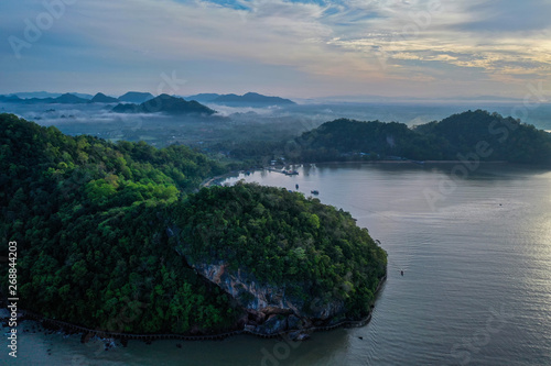 Aerial drone view of Pakbara small village during cloudy morning, Thailand photo