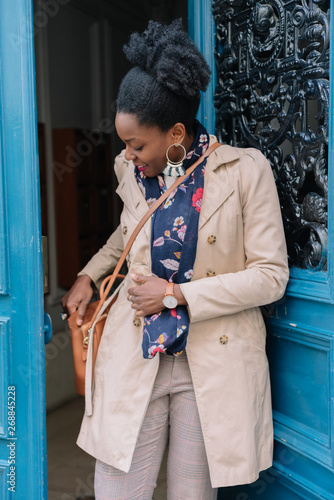 Woman leaving her apartment building