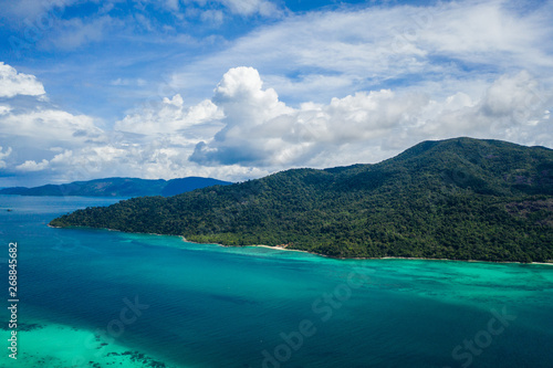 Aerial drone view of beautiful green Koh Usen island with amazing lagoon sea over summer sky background  Thailand