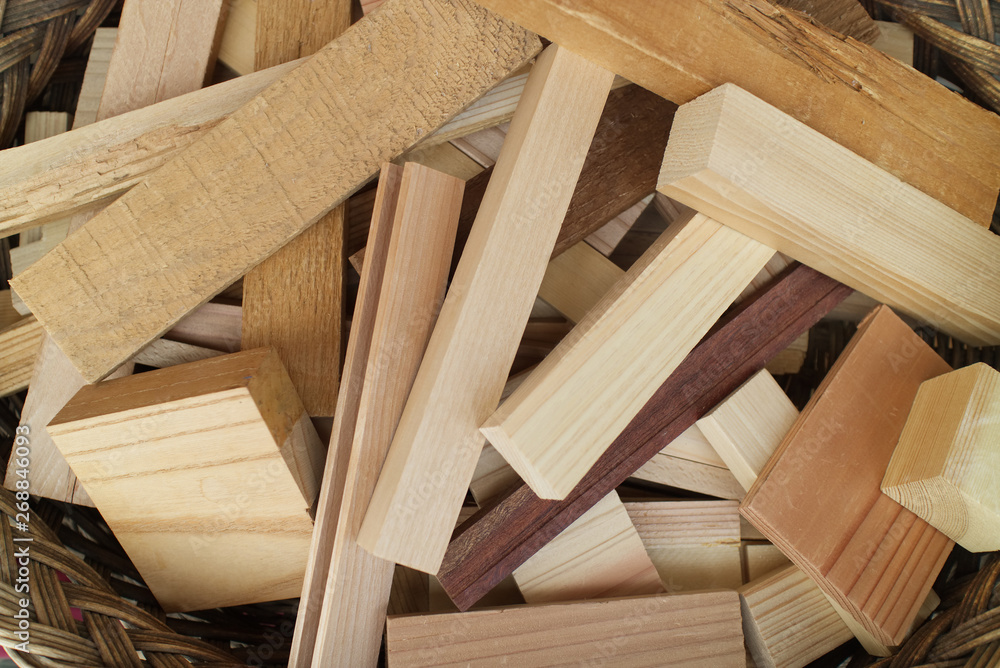Background of many kinds of wood timber in the basket