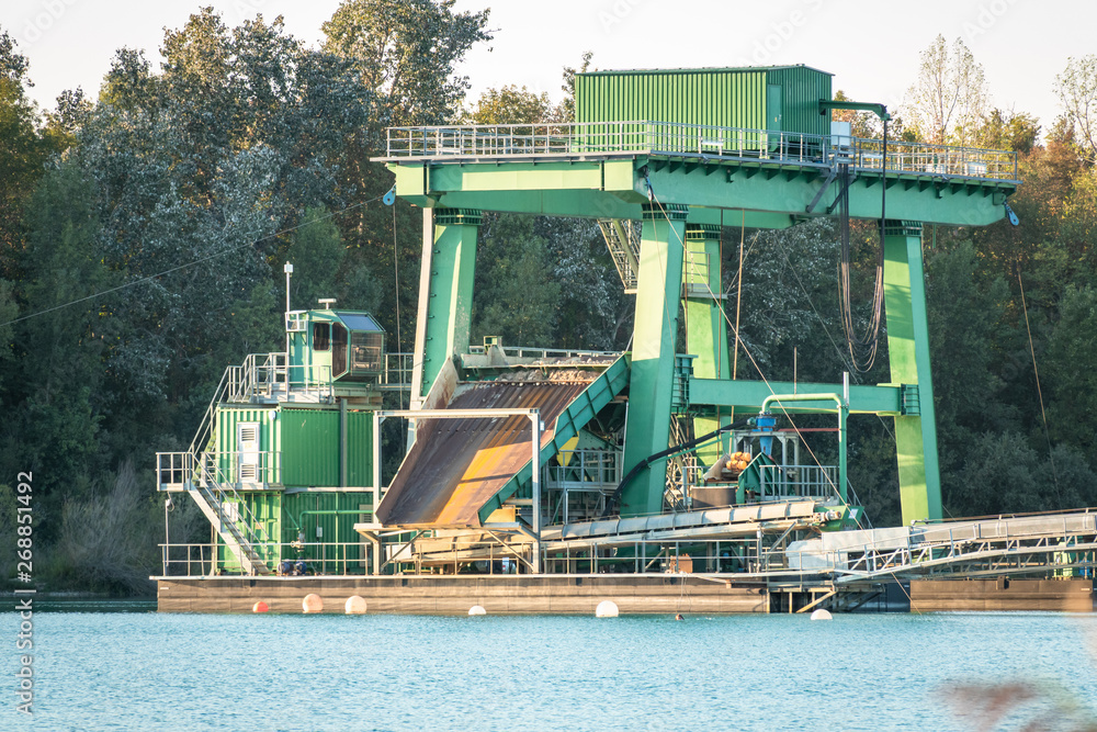 excavator for pebbles on a lake excavator for pebbles on a lake