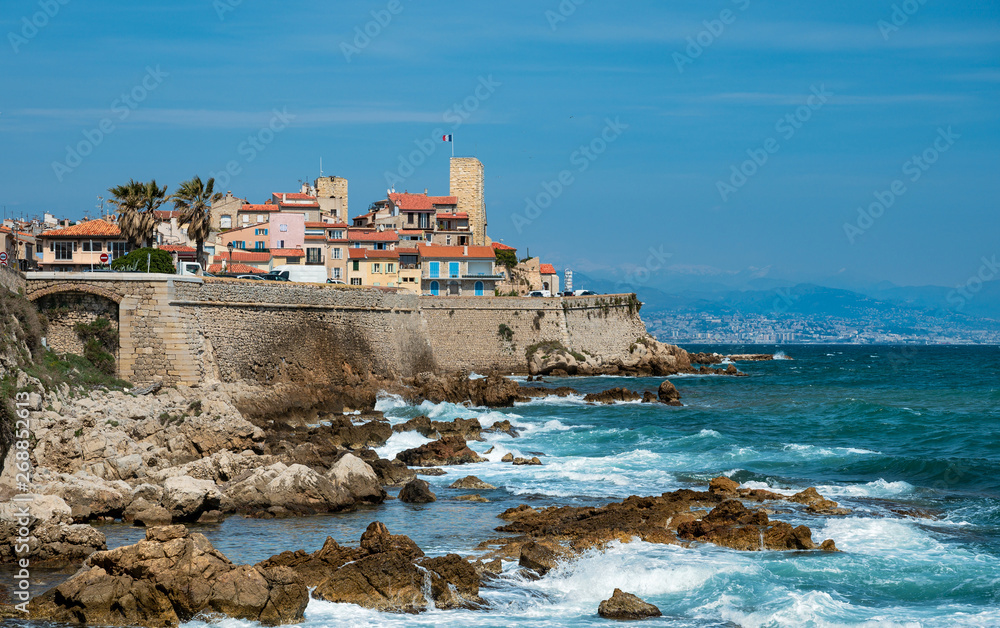 Fototapeta premium Fortified walls of Antibes above the Mediterranean sea, French Riviera, France .