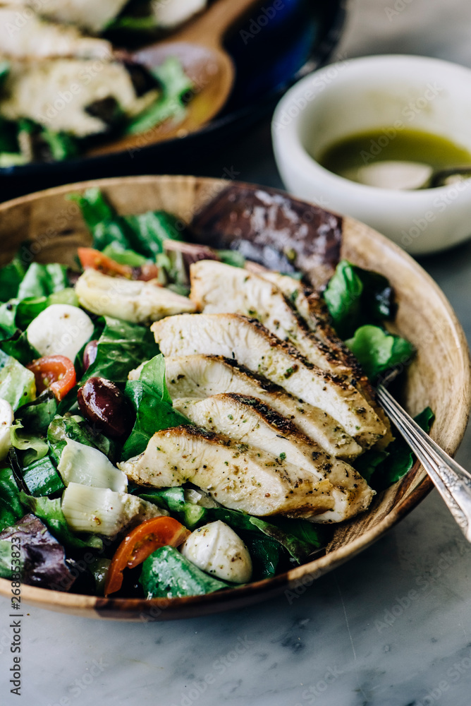 Grilled Mediterranean Chicken Salad In A Wooden Bowl Grilled Mediterranean Chicken Salad In A Wooden Bowl