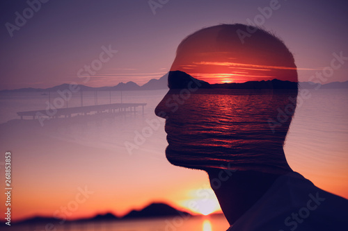 Silhouette of a young man i...